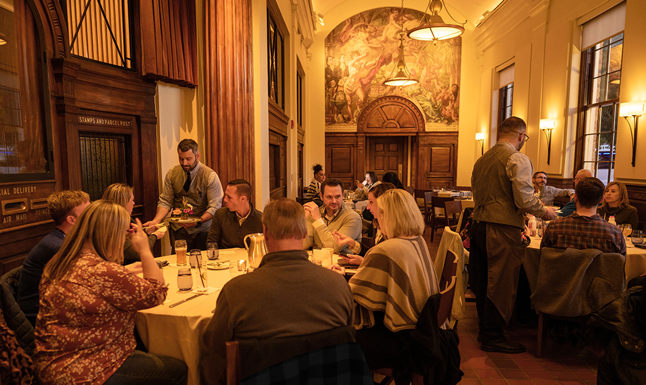 patrons at restaurant tables